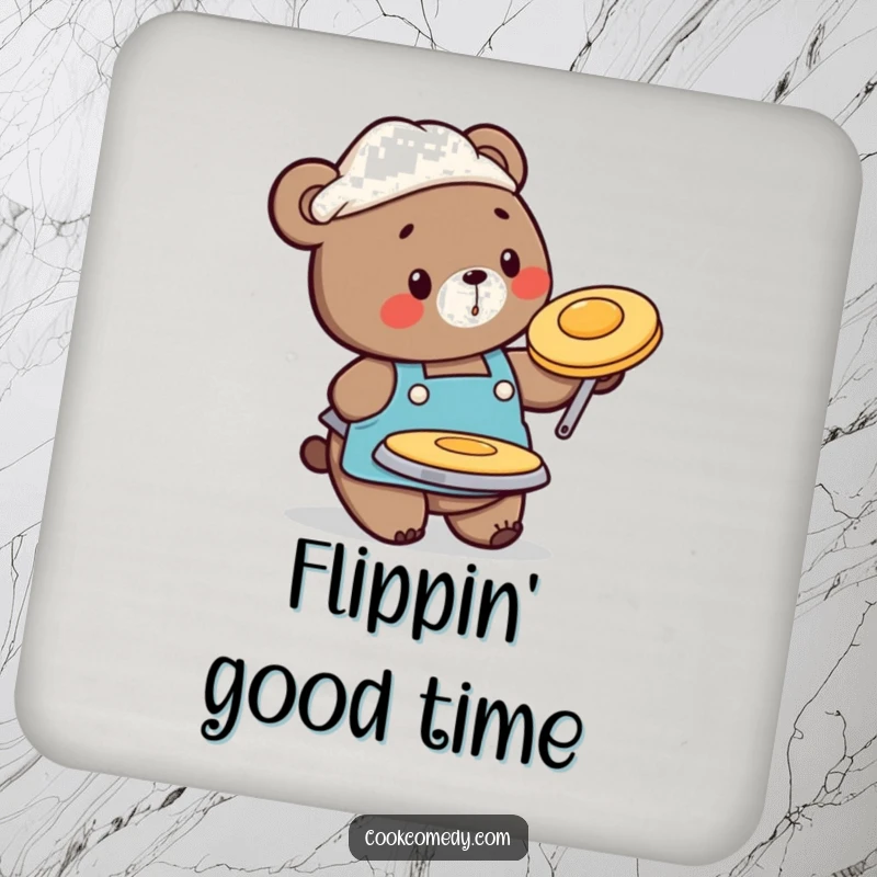 Funny coaster featuring a busy bear chef in an apron, flipping a pancake, protecting surfaces with charm.