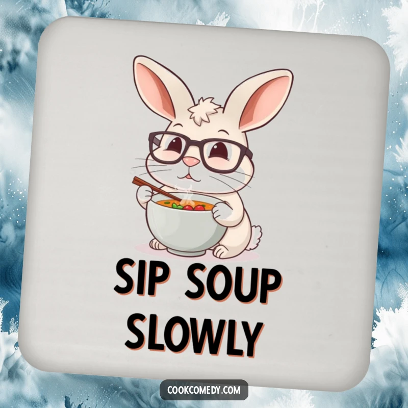 A funny rabbit chef with oversized glasses carefully tasting a miniature soup bowl on a protective drink coaster.
